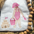 Girl And Sandcastle