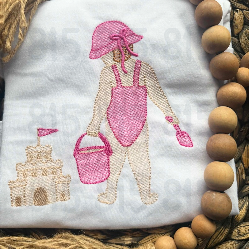 Girl And Sandcastle
